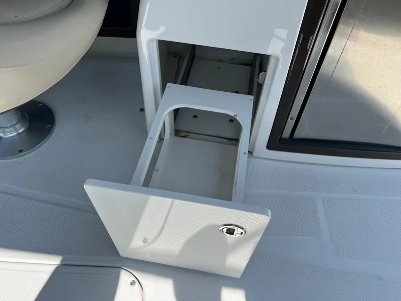 Slide: The Image of 2015 Monterey 268 SC boat interior storage compartment. - 24