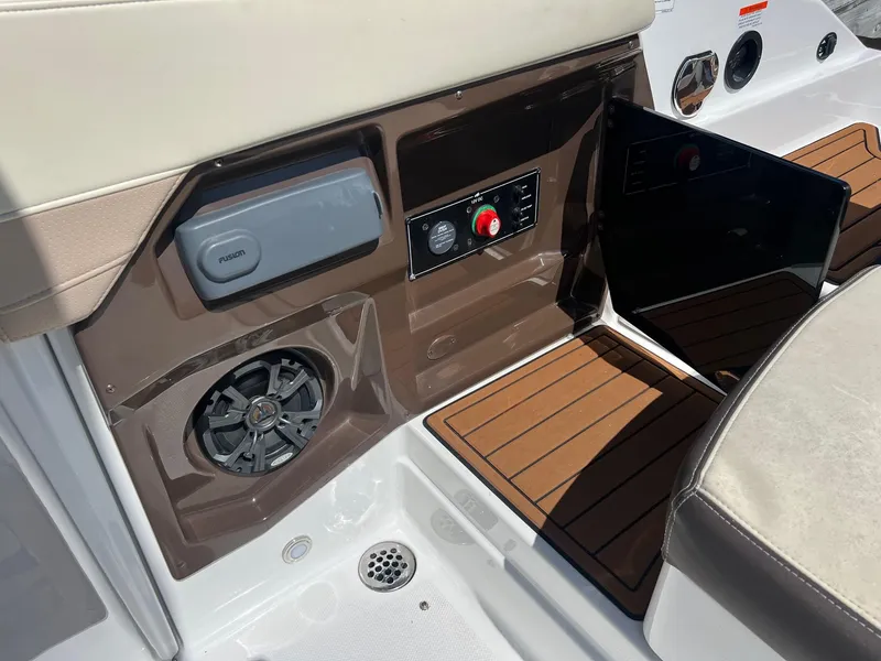Slide: The Image of 2015 Monterey 268 SC boat interior with control panel and speaker. - 25