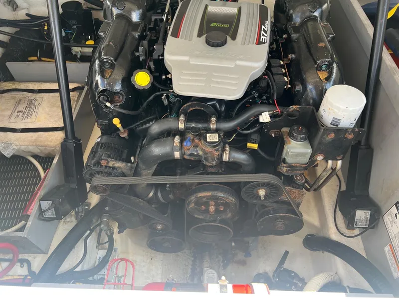 Slide: The Image of Engine compartment of a 2015 Monterey 268 SC boat. - 27
