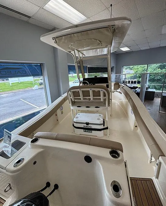 Slide: The Image of 2024 Scout 215 XSF boat interior in showroom. - 5