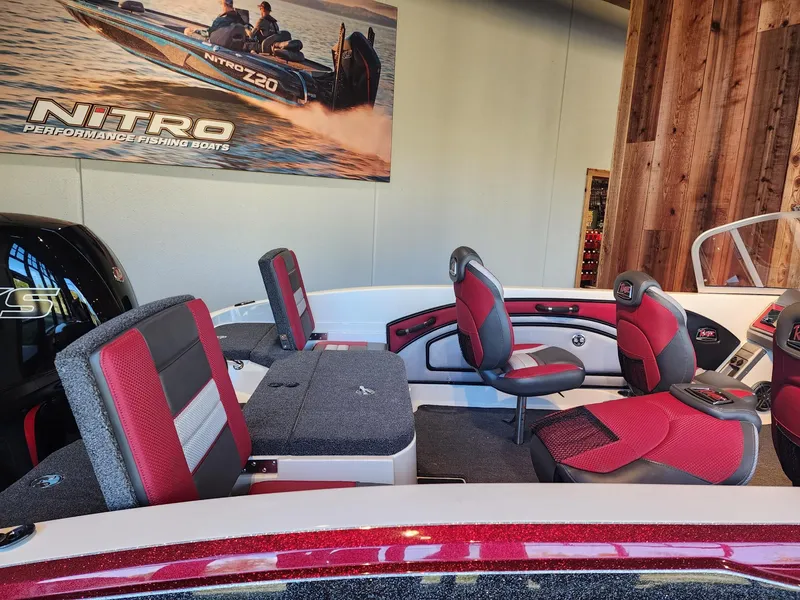 Slide: The Image of 2024 Ranger 1850MS boat interior with red and black seats. - 4