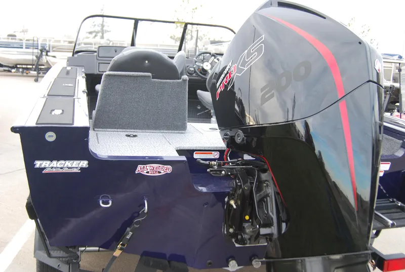 Slide: The Image of 2024 Tracker Targa V-19 Combo boat with powerful outboard motor. - 2