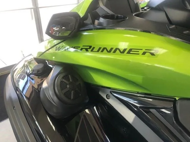 Slide: The Image of 2024 Yamaha WaveRunner FX Cruiser SVHO with Audio, green and black, close-up view. - 4