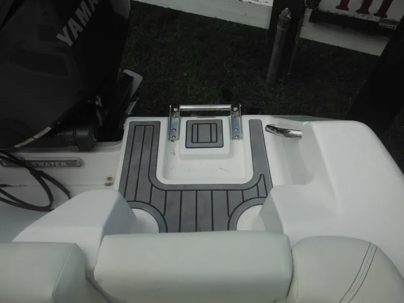 Slide: The Image of 2024 Tidewater 220 LXF boat stern with Yamaha engine and swim platform. - 14