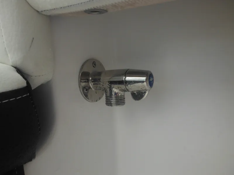 Slide: The Image of Chrome fitting on a 2024 Tidewater 220 LXF boat interior. - 22