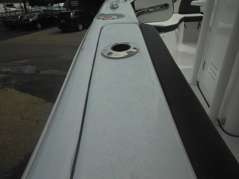 Slide: The Image of 2024 Tidewater 220 LXF boat deck with rod holder. - 29