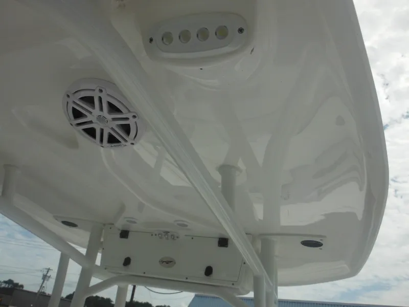 Slide: The Image of 2024 Tidewater 220 LXF boat interior ceiling with speakers and lights. - 37