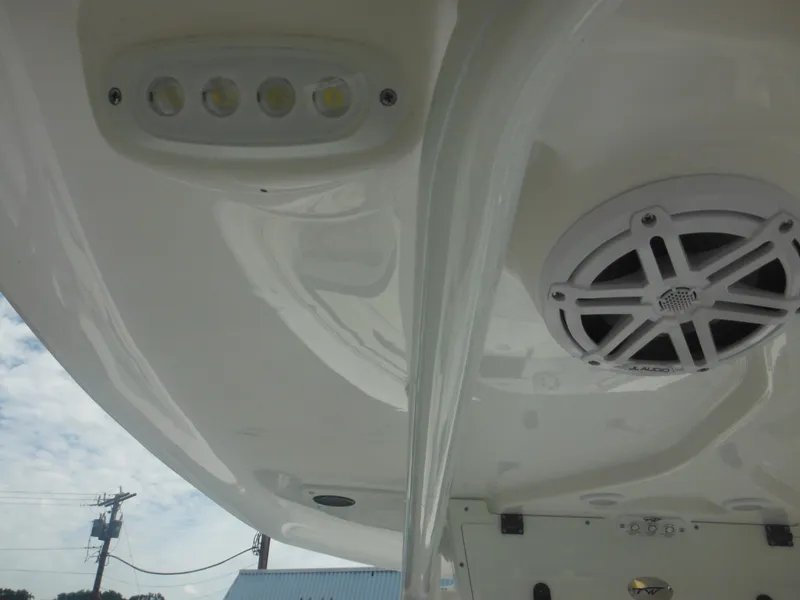 Slide: The Image of Close-up of 2024 Tidewater 220 LXF boat's LED lights and speaker system. - 38