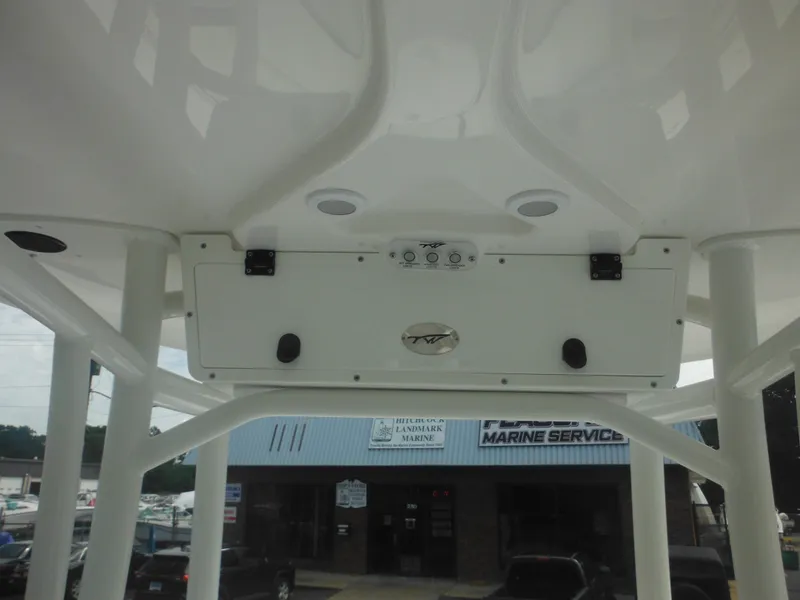 Slide: The Image of 2024 Tidewater 220 LXF boat console with overhead electronics. - 39