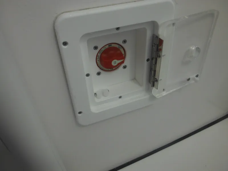 Slide: The Image of Battery switch compartment on a 2024 Tidewater 220 LXF boat. - 47