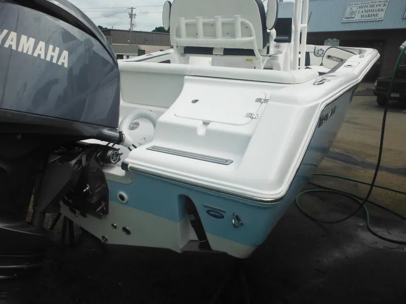 Slide: The Image of 2024 Tidewater 220 LXF boat with Yamaha outboard motor, rear view. - 8
