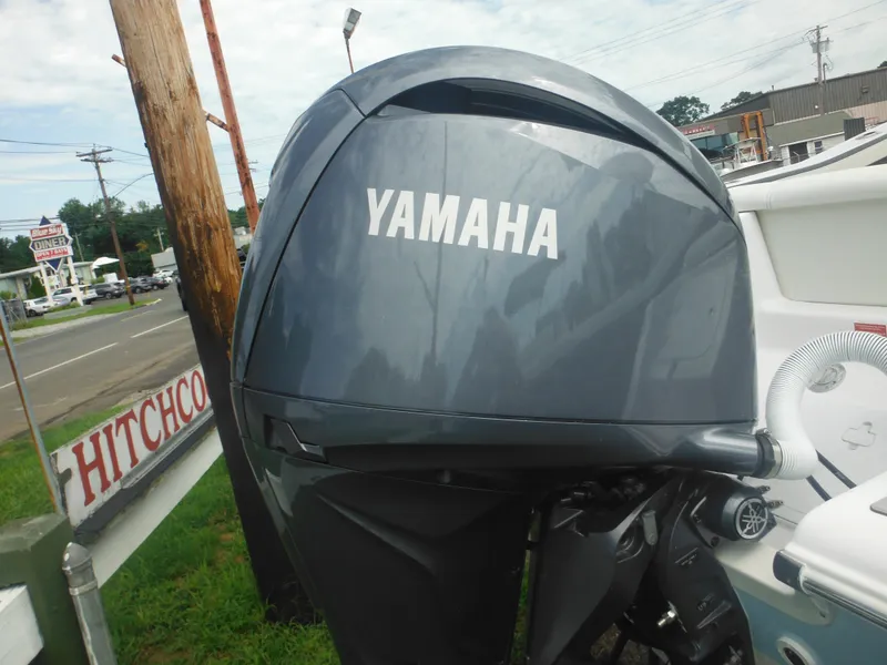 Slide: The Image of 2024 Tidewater 220 LXF boat with Yamaha outboard motor. - 9