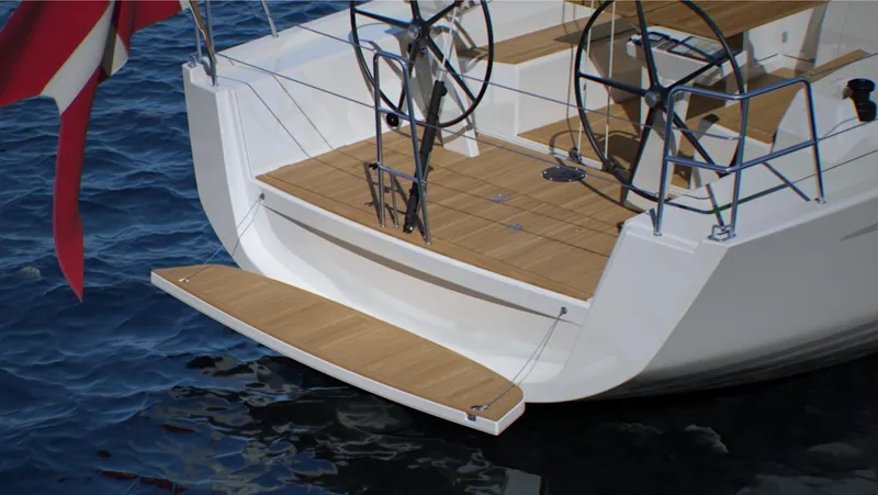 Slide: The Image of 2024 X-Yachts X4-0 sailboat stern with dual steering wheels and teak deck. - 26