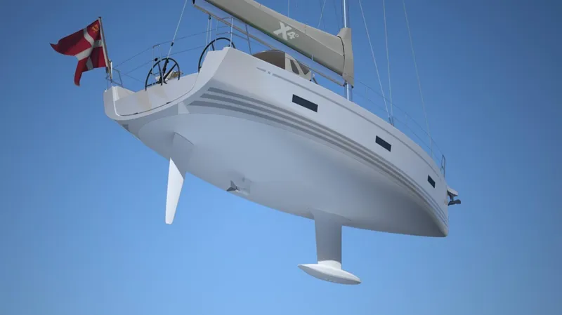 Slide: The Image of 2024 X-Yachts X4-0 sailboat with Danish flag, viewed from below against blue sky. - 30