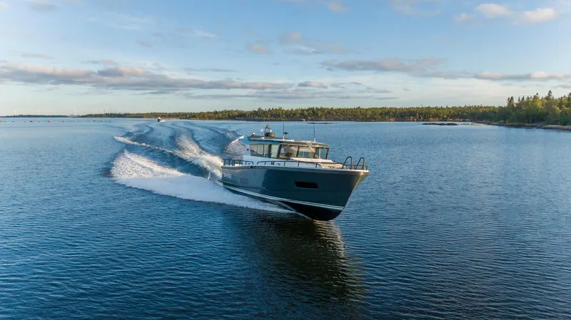Slide: The Image of Sargo 45 Cat A 2025 motorboat cruising on open water. - 5