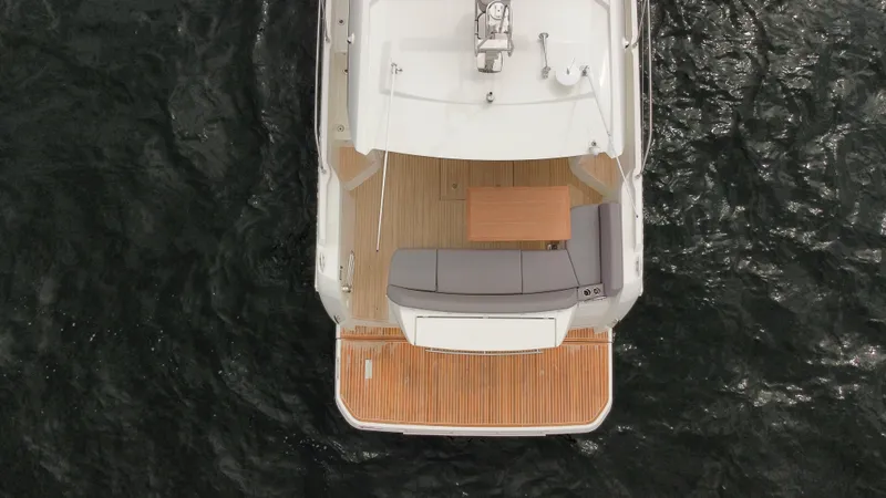 Slide: The Image of Top view of 2024 Prestige 420S yacht's deck on water. - 10