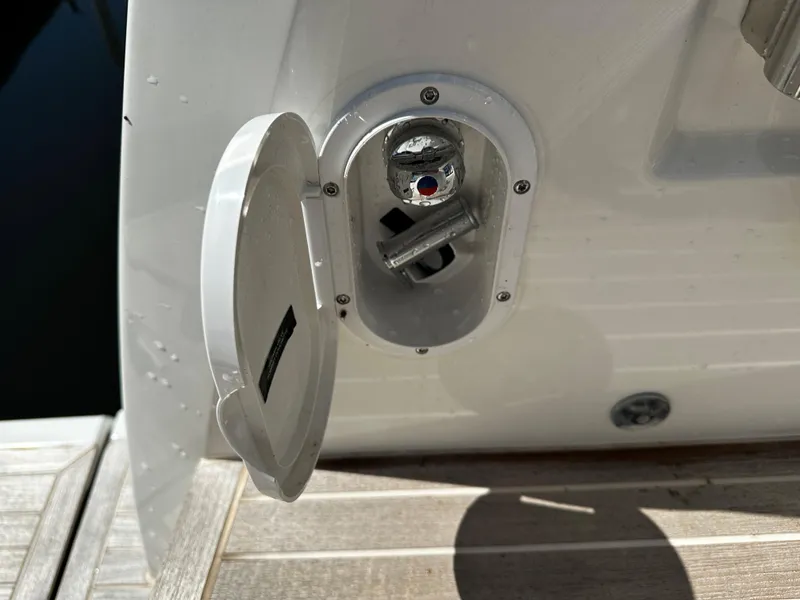 Slide: The Image of Prestige 420S 2024 model boat water inlet valve on deck. - 18
