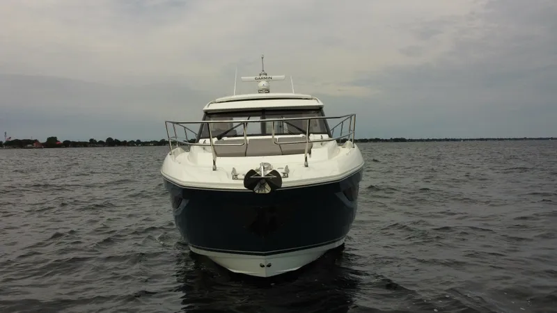 Slide: The Image of 2024 Prestige 420S yacht on open water. - 3