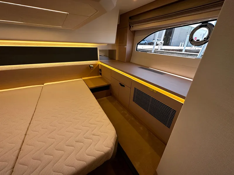 Slide: The Image of Prestige 420S 2024 yacht interior cabin with modern design and ambient lighting. - 43