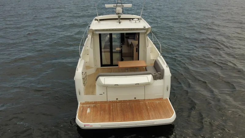 Slide: The Image of 2024 Prestige 420S yacht rear view on water. - 9