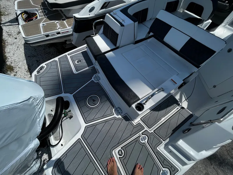 Slide: The Image of 2024 Monterey M-65 boat deck with seating and non-slip flooring. - 5