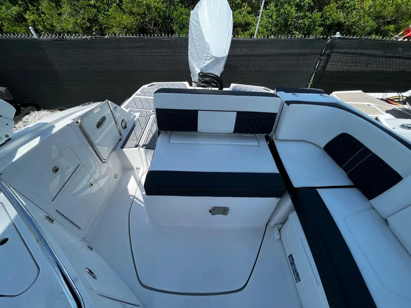 Slide: The Image of 2024 Monterey M-65 boat interior with white and black seating. - 7