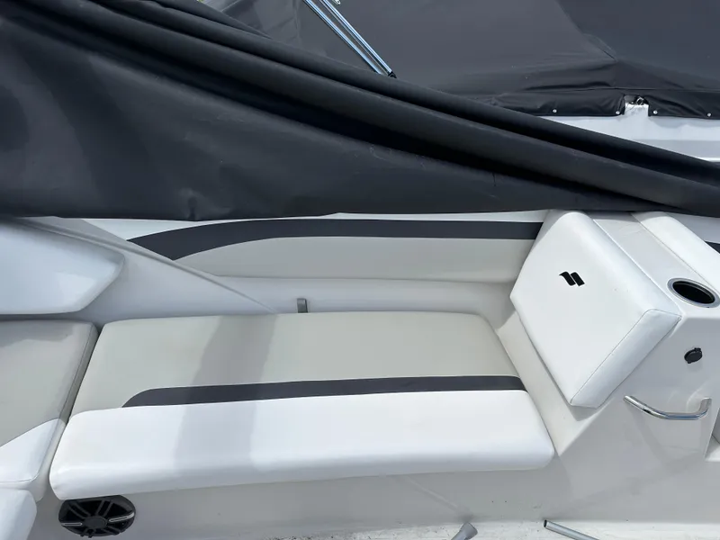 Slide: The Image of 2024 Starcraft SVX171 boat interior with white and gray seating. - 5