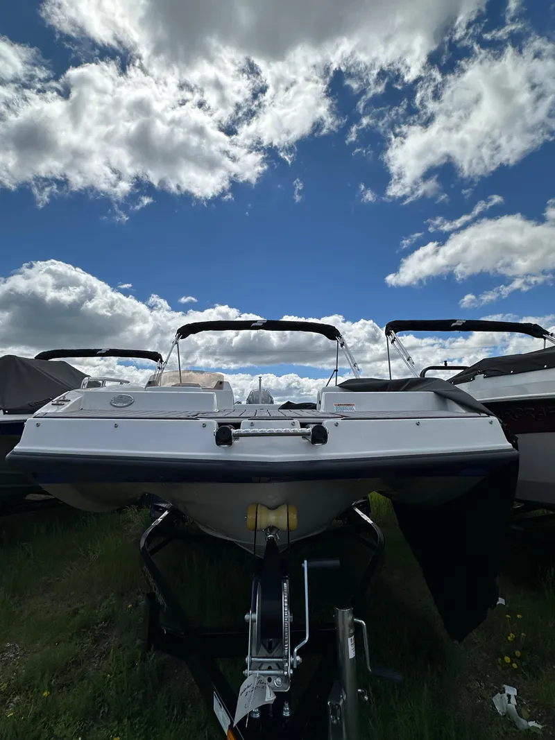 Slide: The Image of 2024 Starcraft SVX171 boat under a cloudy sky. - 9