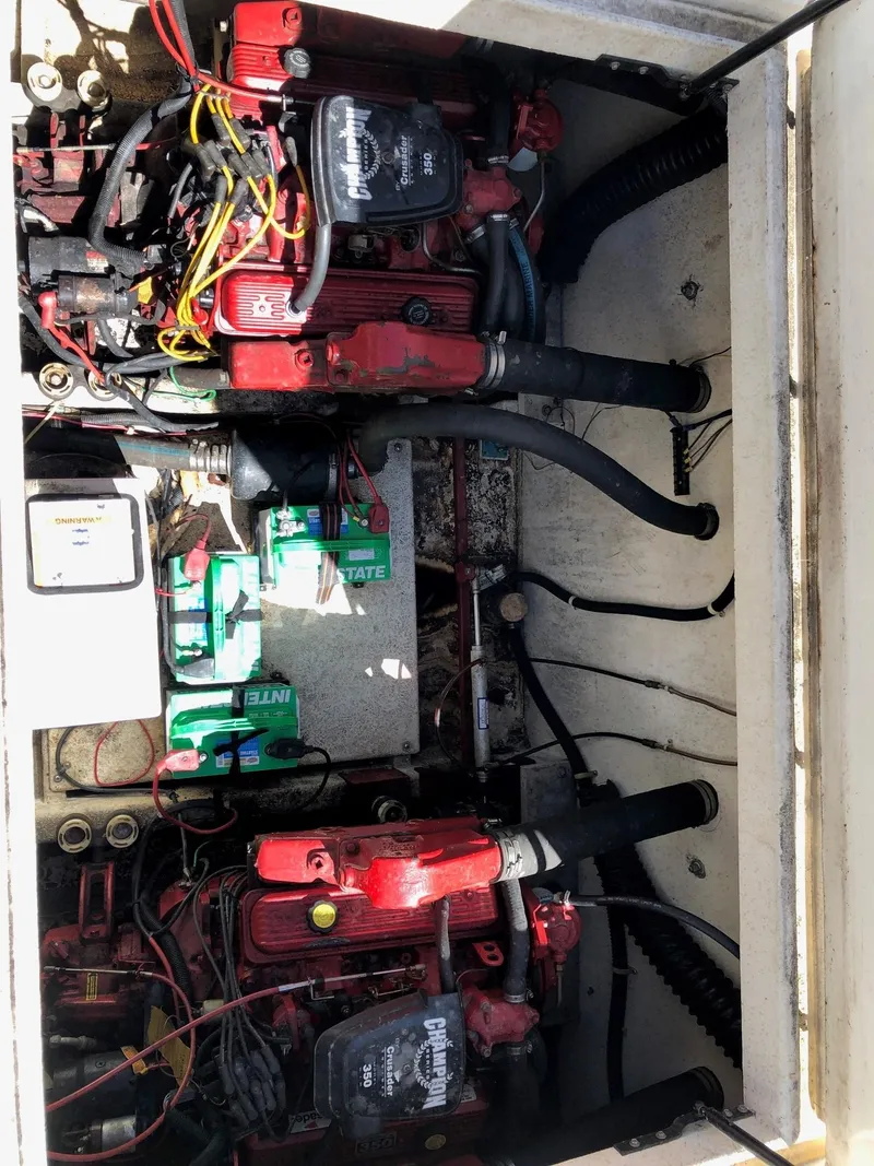 Slide: The Image of 1993 Gibson 37 Sport Series engine compartment with dual engines and batteries. - 19