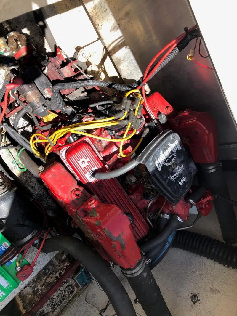 Slide: The Image of 1993 Gibson 37 Sport Series engine compartment with visible wiring and components. - 20