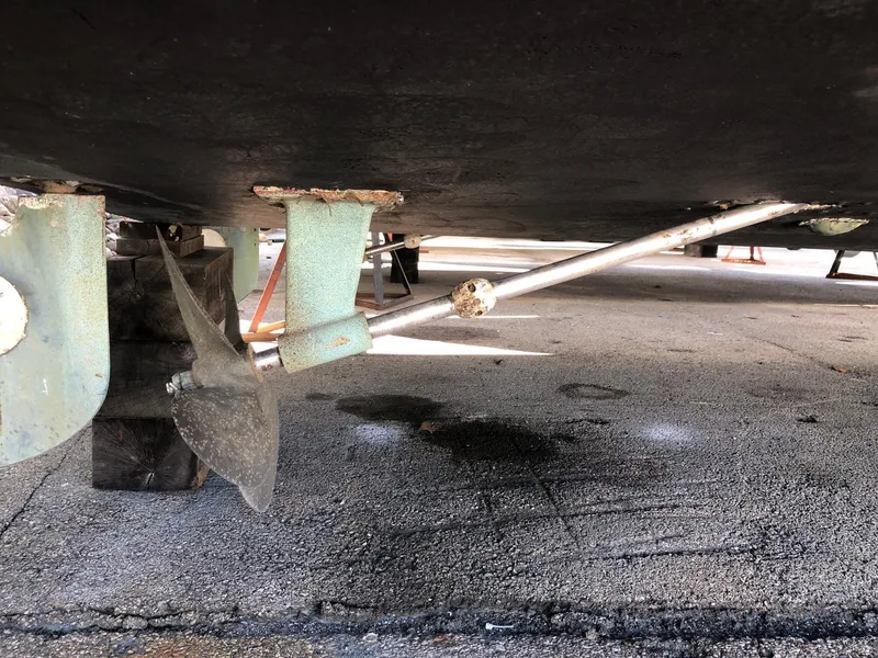 Slide: The Image of 1993 Gibson 37 Sport Series boat propeller and rudder system. - 3