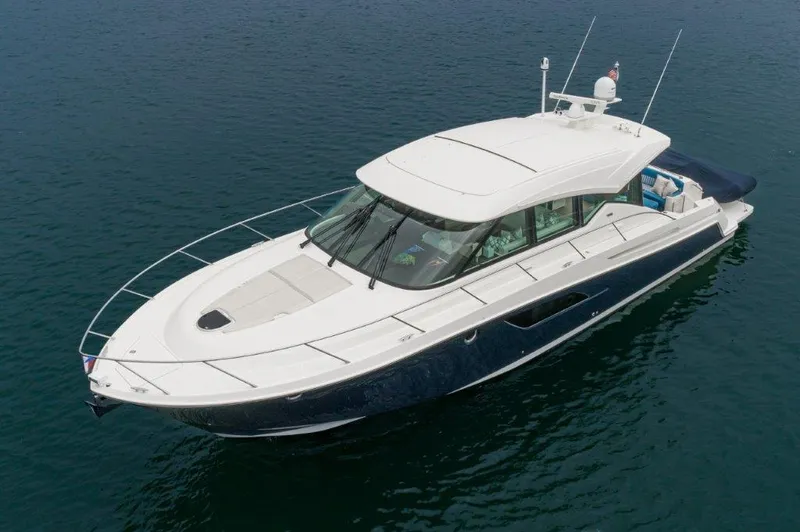 Slide: The Image of 2017 Tiara Yachts C53 Coupe on calm water. - 1
