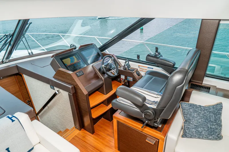 Slide: The Image of Interior of 2017 Tiara Yachts C53 Coupe with helm station. - 13