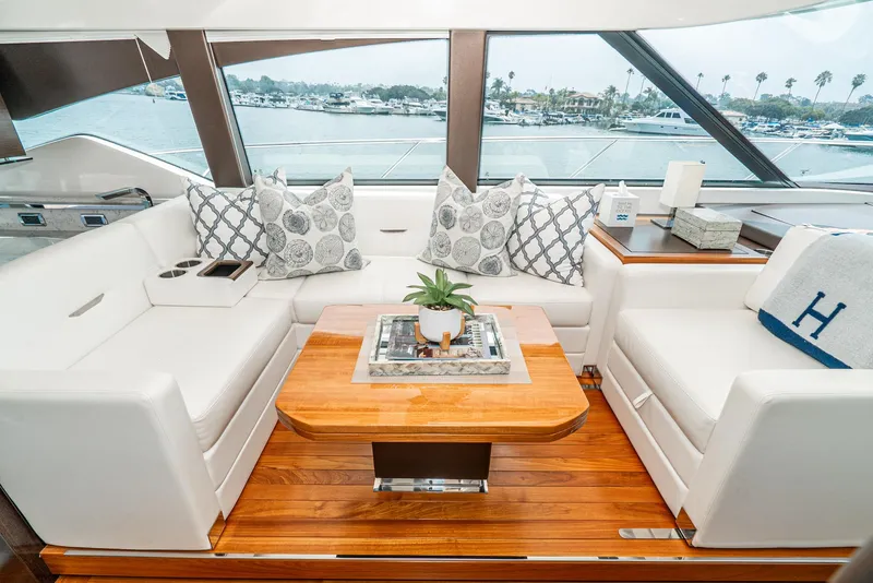 Slide: The Image of Interior of 2017 Tiara Yachts C53 Coupe with luxurious seating area. - 14