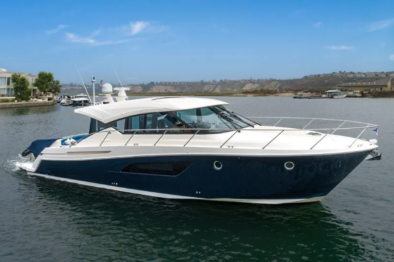 Slide: The Image of 2017 Tiara Yachts C53 Coupe on calm waters. - 2