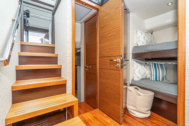 Slide: The Image of Interior of 2017 Tiara Yachts C53 Coupe with stairs and bunk beds. - 20