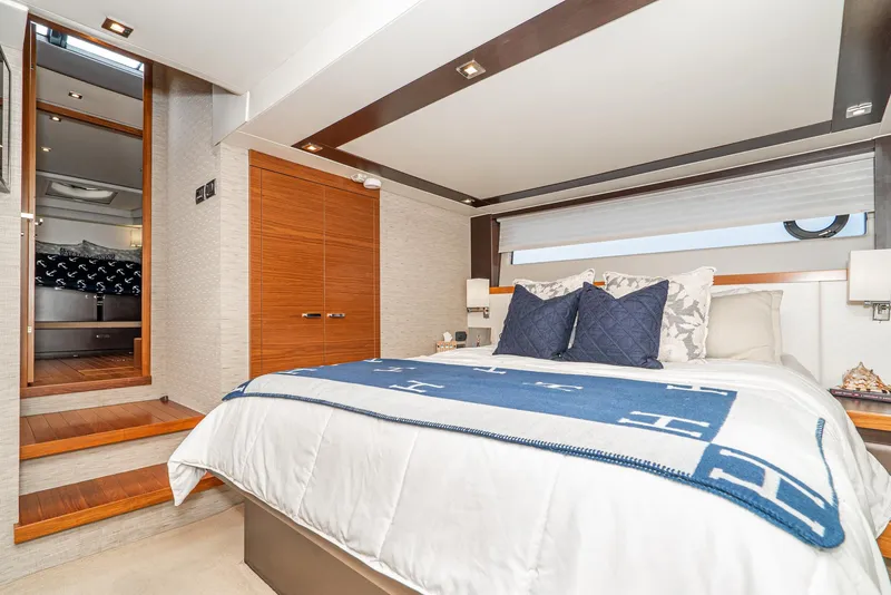 Slide: The Image of Luxurious bedroom in a 2017 Tiara Yachts C53 Coupe. - 23