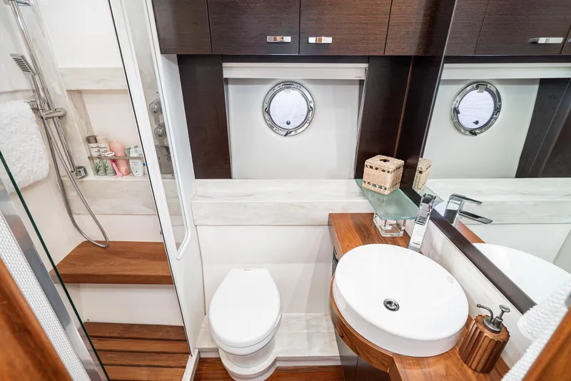 Slide: The Image of Luxurious bathroom in a 2017 Tiara Yachts C53 Coupe. - 24