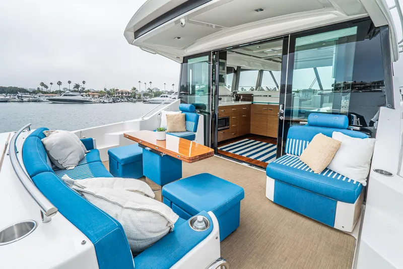 Slide: The Image of Luxurious interior of 2017 Tiara Yachts C53 Coupe with blue upholstery. - 35