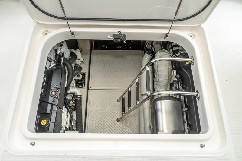Slide: The Image of Engine compartment of 2017 Tiara Yachts C53 Coupe with ladder. - 37