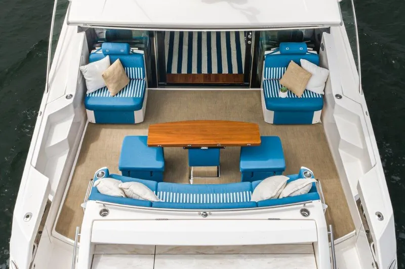 Slide: The Image of Luxurious interior of 2017 Tiara Yachts C53 Coupe with blue seating. - 4