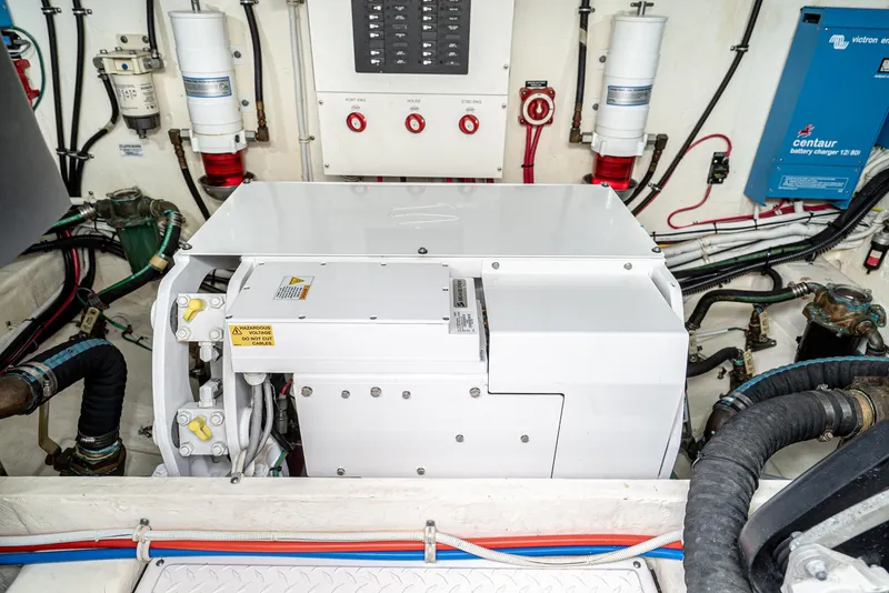 Slide: The Image of Engine room of 2017 Tiara Yachts C53 Coupe with generator. - 40
