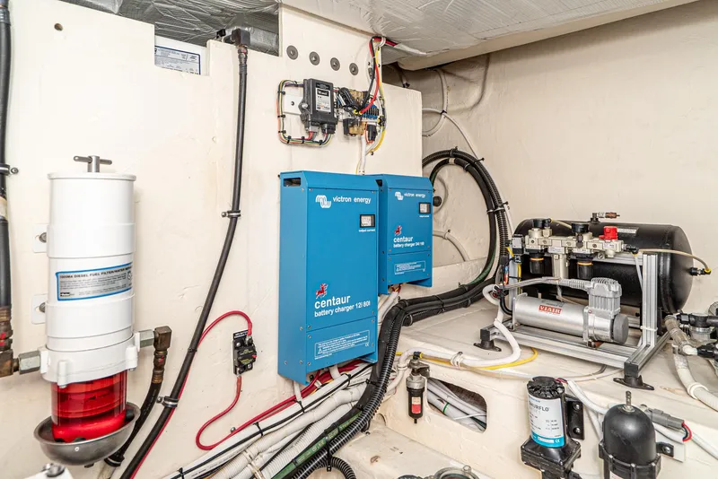 Slide: The Image of Engine room of 2017 Tiara Yachts C53 Coupe with Victron Energy battery charger. - 42