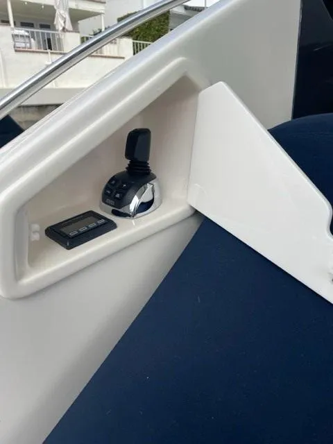 Slide: The Image of Control console of the 2017 Tiara Yachts C53 Coupe. - 47