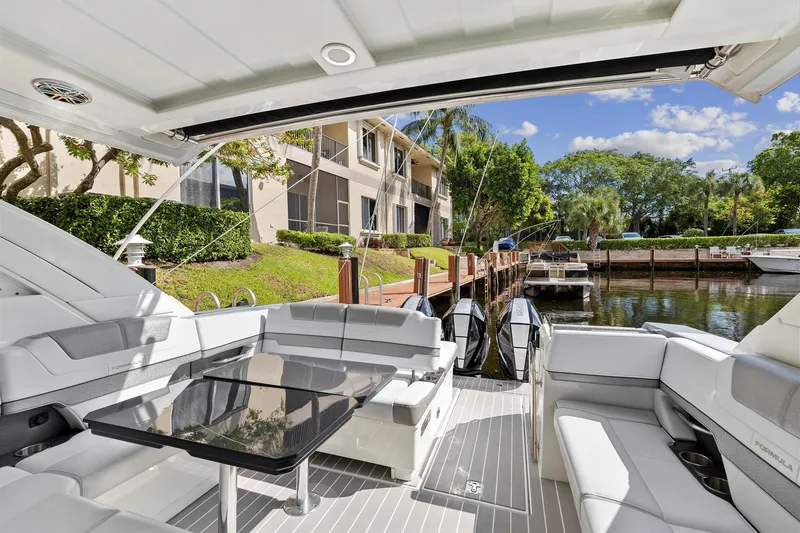 Slide: The Image of Interior of a 2021 Formula 380 Super Sport Crossover OB yacht at dock. - 12