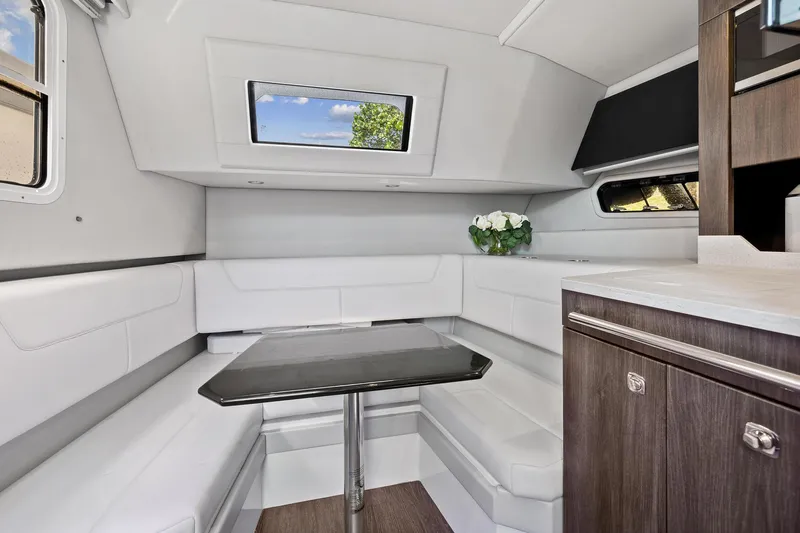 Slide: The Image of Interior of 2021 Formula 380 Super Sport Crossover OB with sleek seating area. - 21