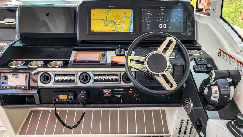 Slide: The Image of 2021 Formula 380 Super Sport Crossover OB cockpit with modern navigation. - 7