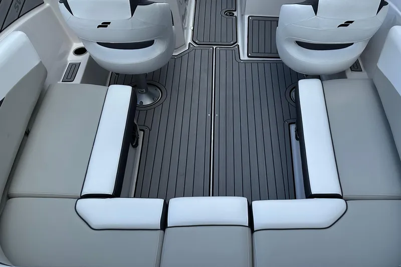 Slide: The Image of 2024 Starcraft SVX 230 OB boat with spacious seating and modern design. - 11