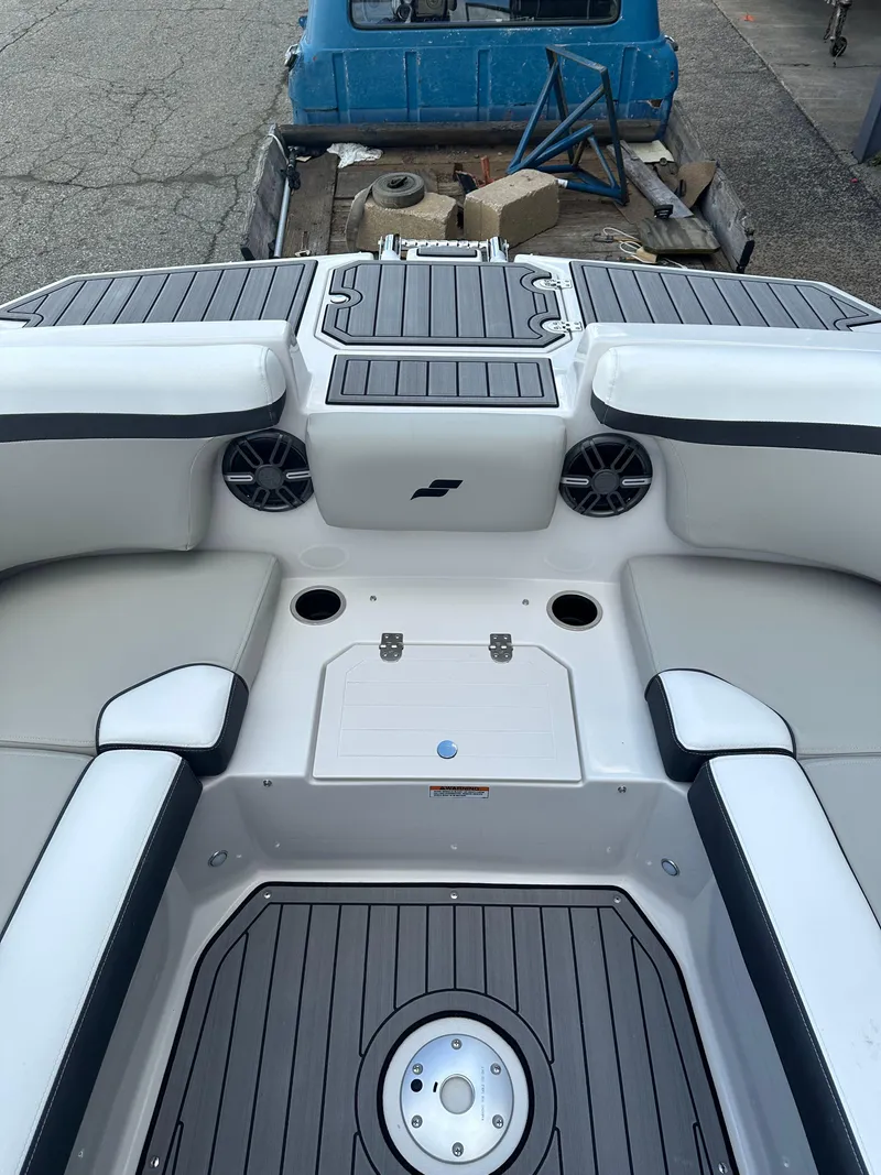 Slide: The Image of 2024 Starcraft SVX 230 OB boat interior with spacious seating and modern design. - 26