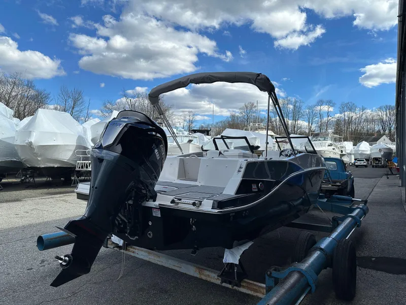 Slide: The Image of 2024 Starcraft SVX 230 OB boat on trailer, rear view. - 9